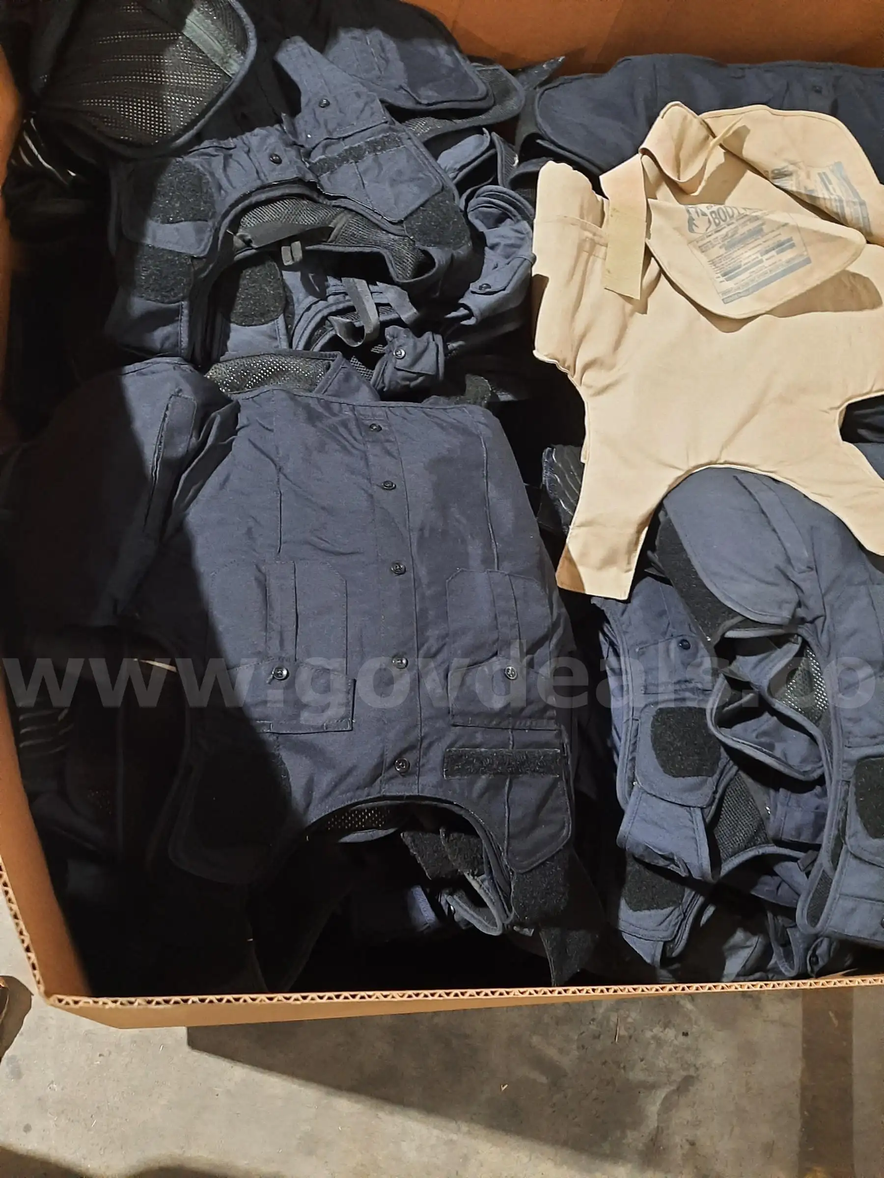 LOT OF APPROXIMATELY 200 SPIKE VEST (MUST BE LAW ENFORCEMENT TO BUY)