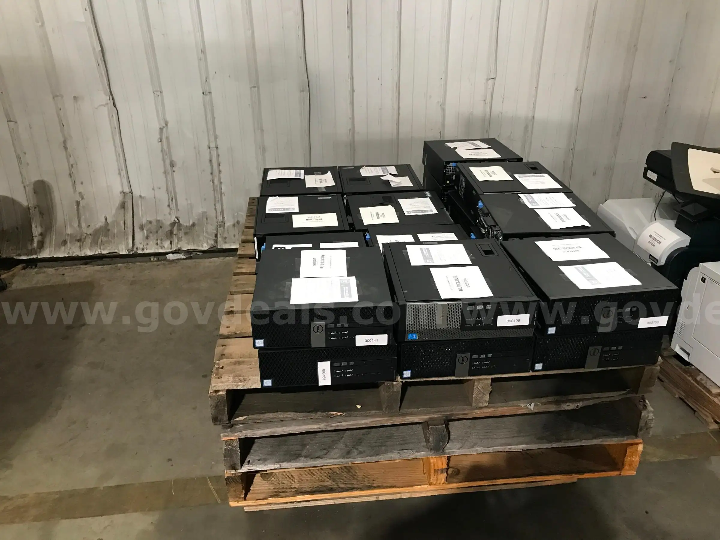 LOT OF COMPUTERS PRINTERS SCANNERS AND MISC. ITEMS ON TWO PALLETS.