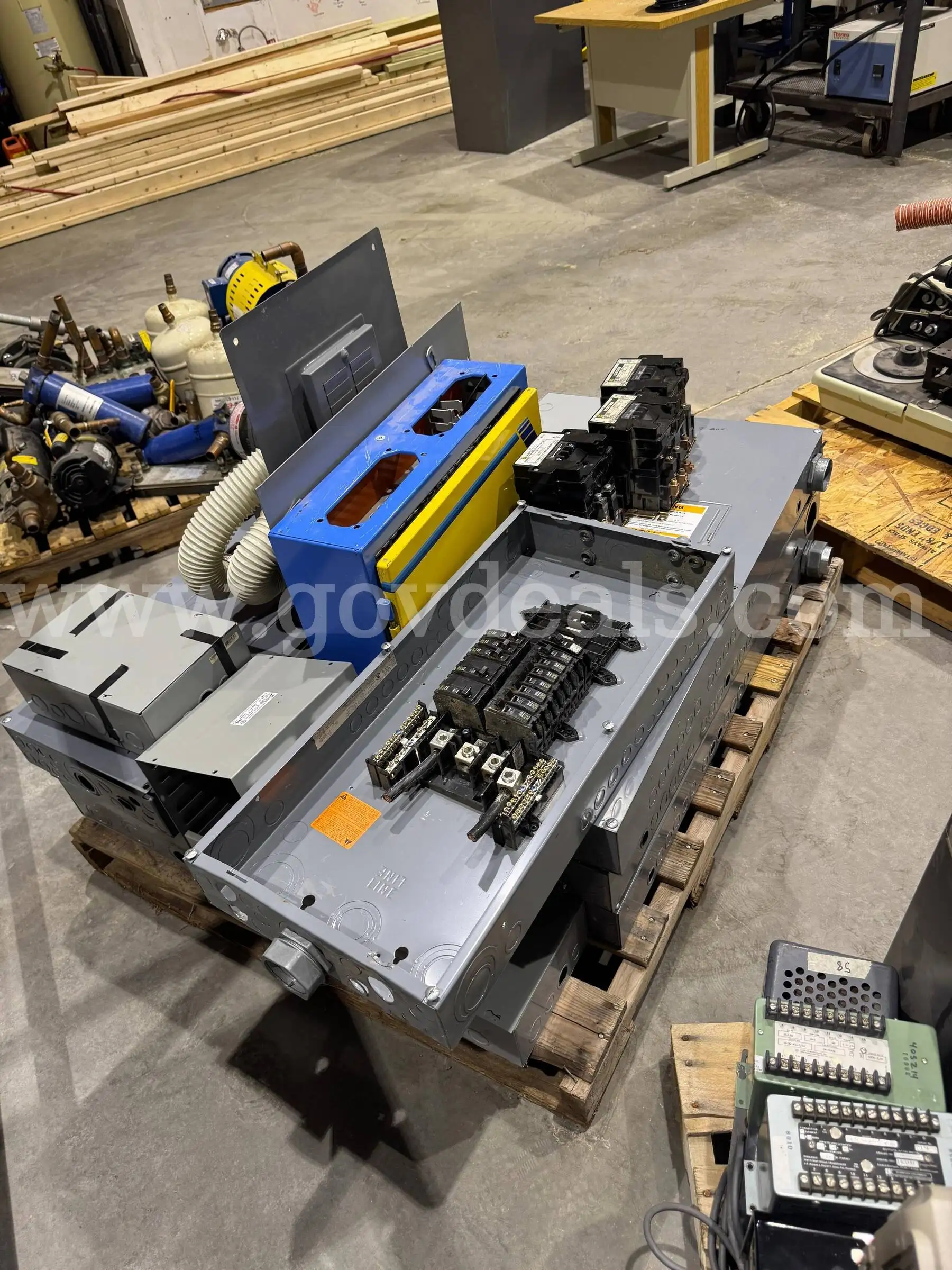 Bundled lot of 100A to 200A circuit breaker panels and enclosures