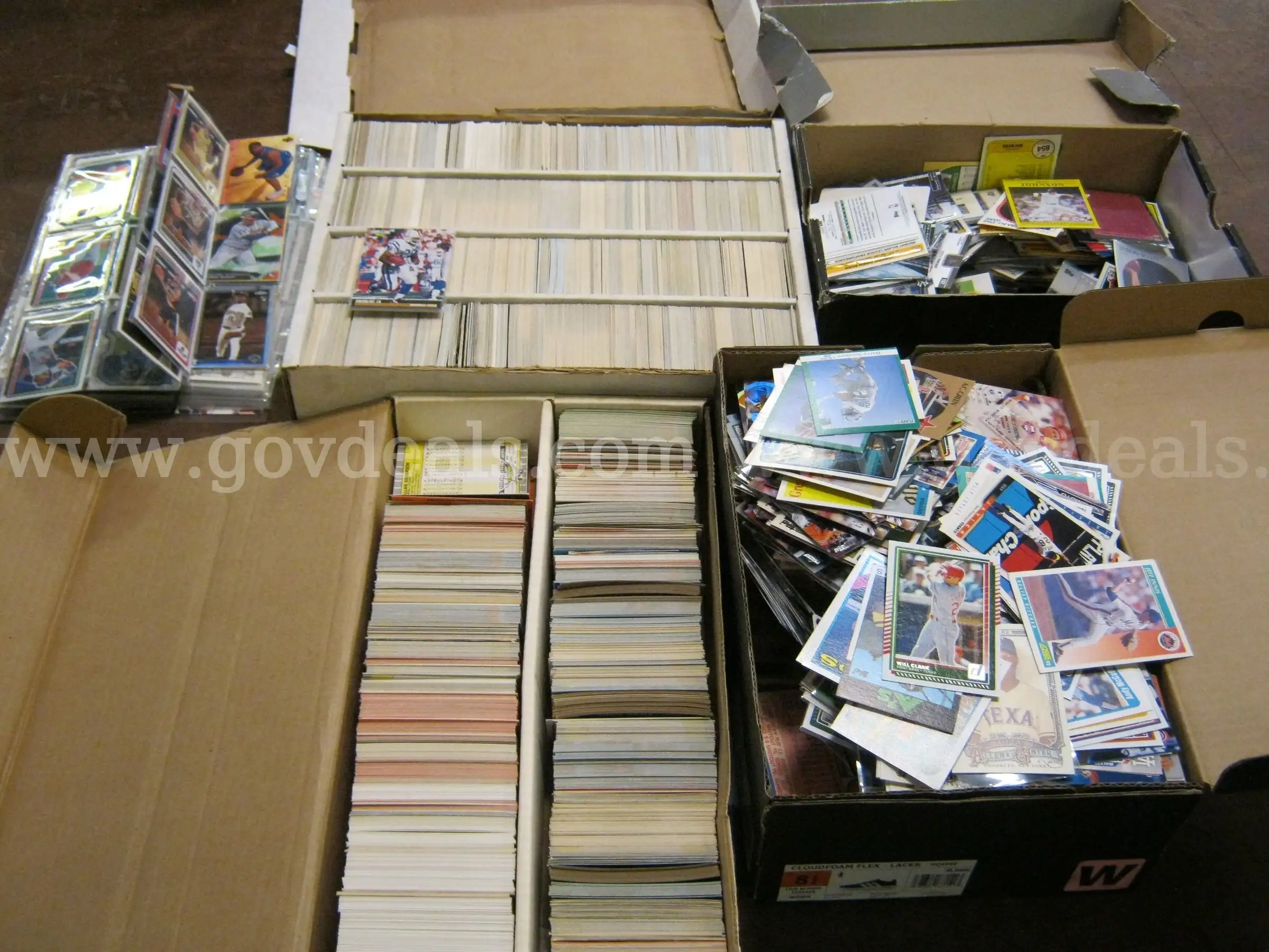 FOUR BOXES OF SPORTS CARDS (GD4335)