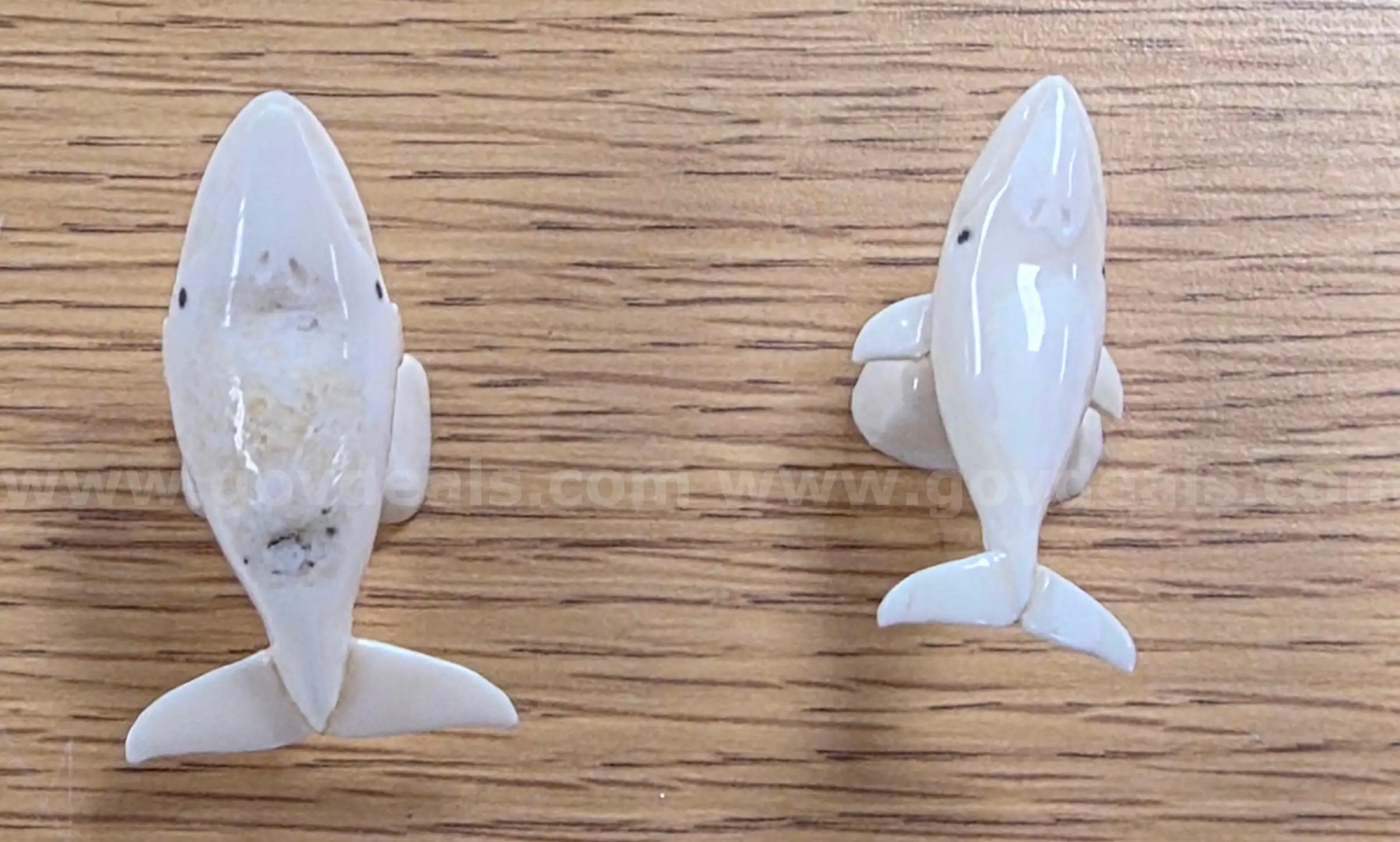 A set of beautifully carved ivory whales ( Anchorage AK)