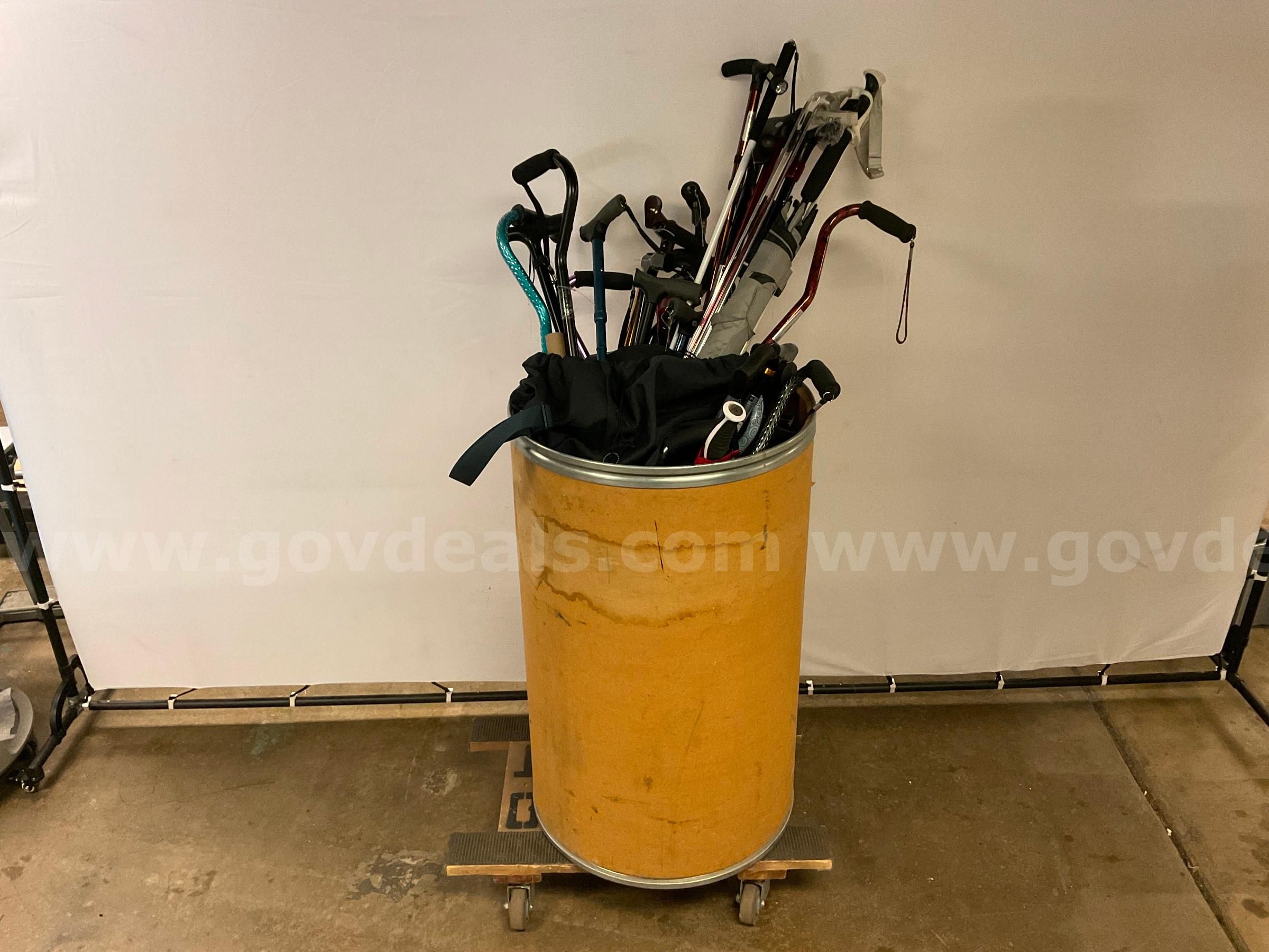 Lot of Canes Walking Sticks & Umbrellas