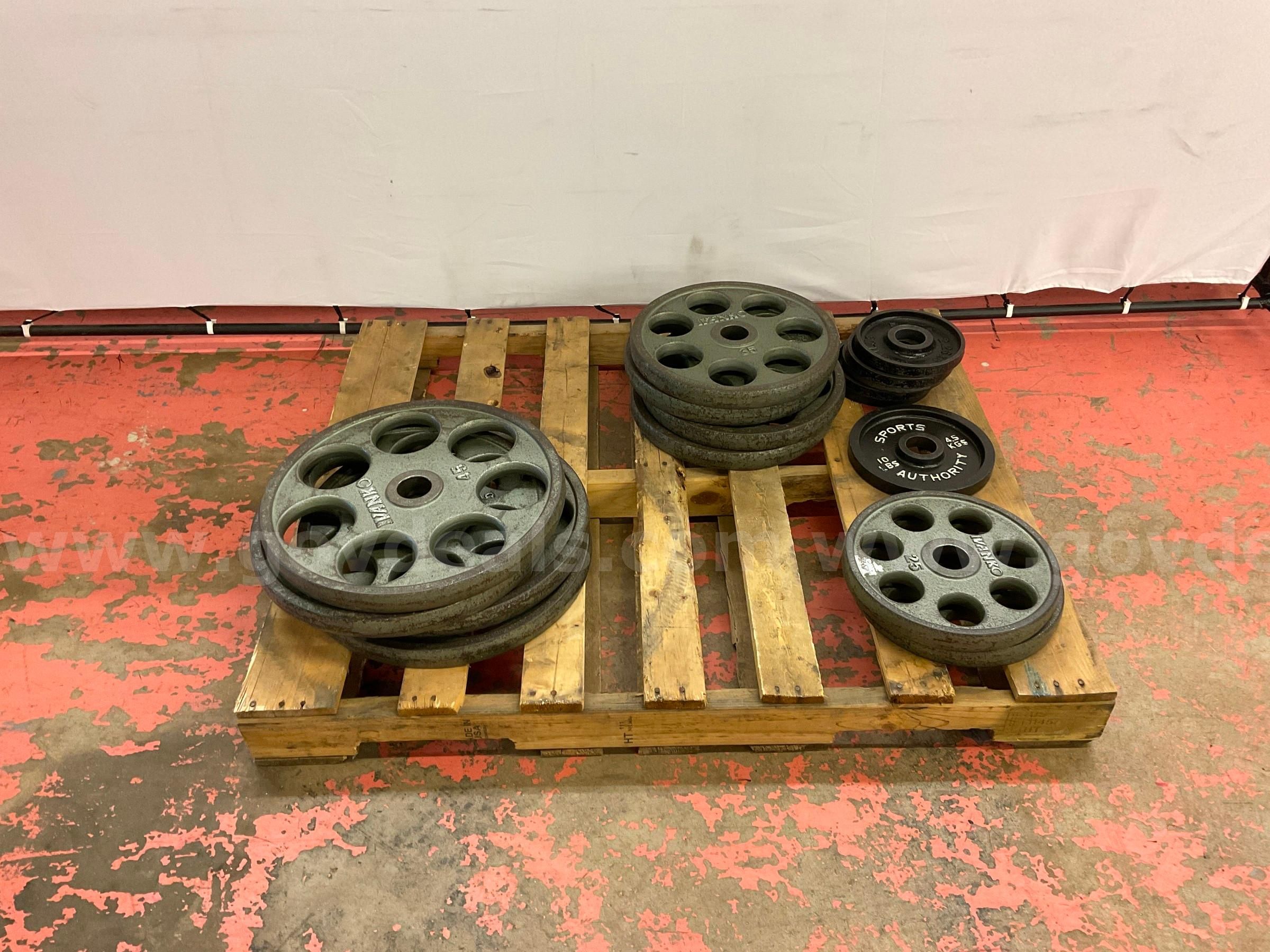 Pallet of Weight Plates 2 - 25lbs 1 - 10lbs 4 - 35lbs 5 - 5lbs & 4 - 45lbs