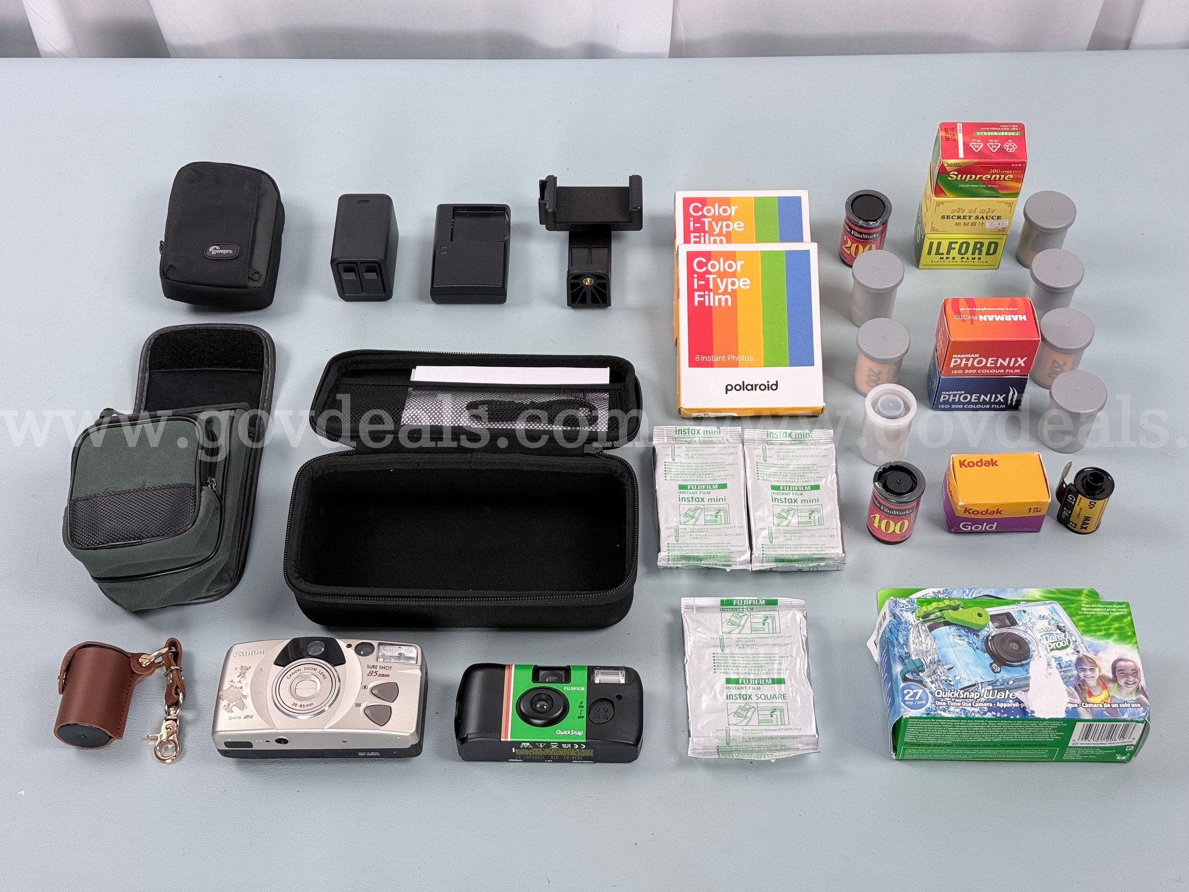 Lot of Misc. Cameras Camera Equipment Film and Accessories Including Canon GoPro Polaroid and More (