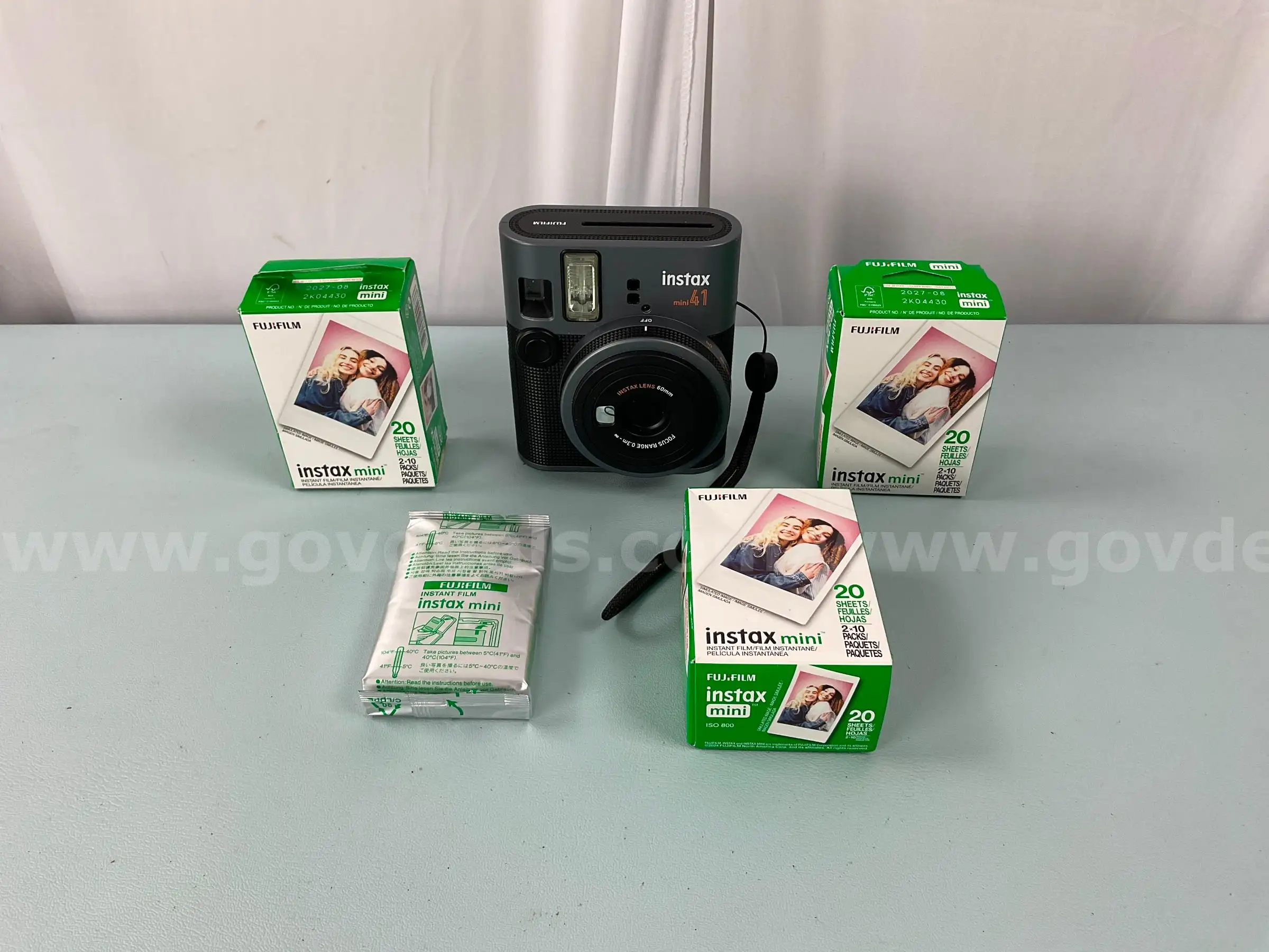 FujiFilm Instax Mini41 Instant Camera with Instax Mini Film Packs (Powers On)