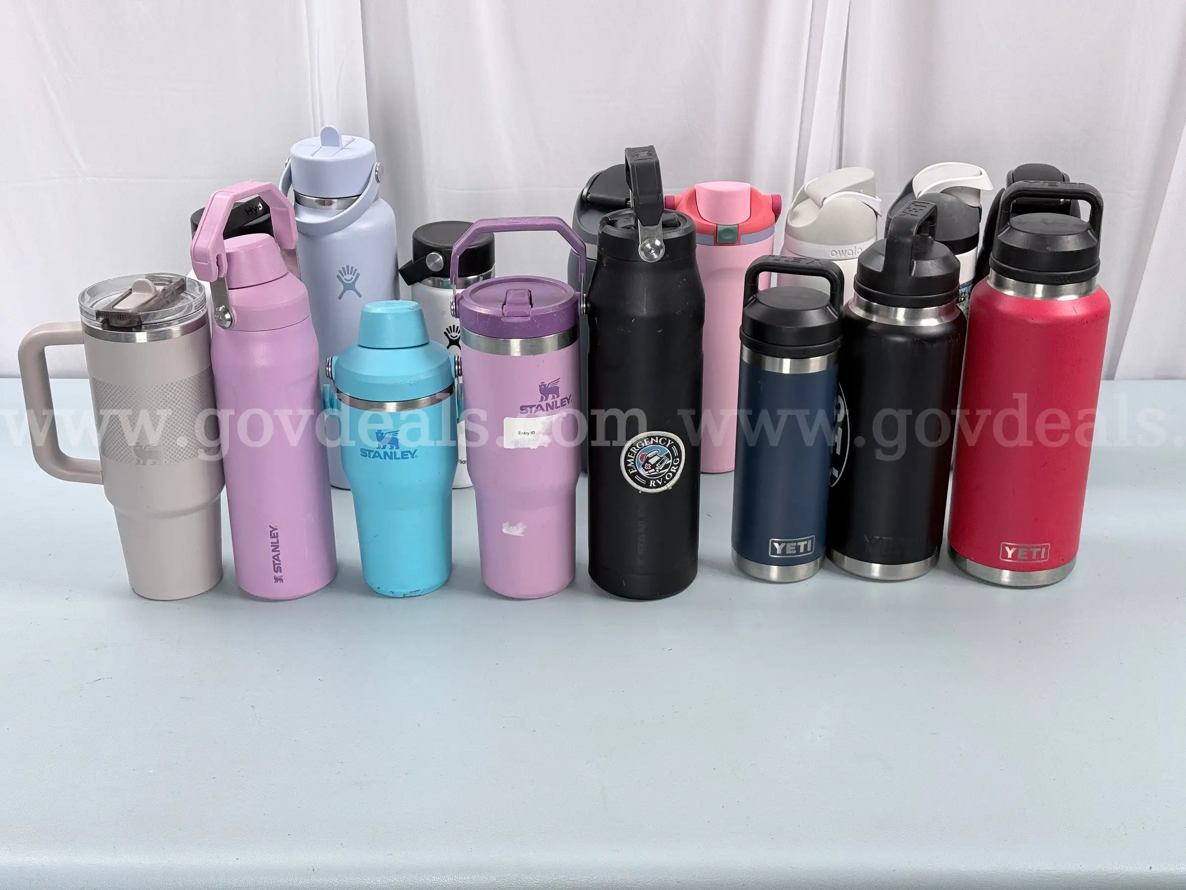 16 - Water Bottles 5 - Owala 5 - Stanley 3 - Yeti and 3 - Hydro Flask