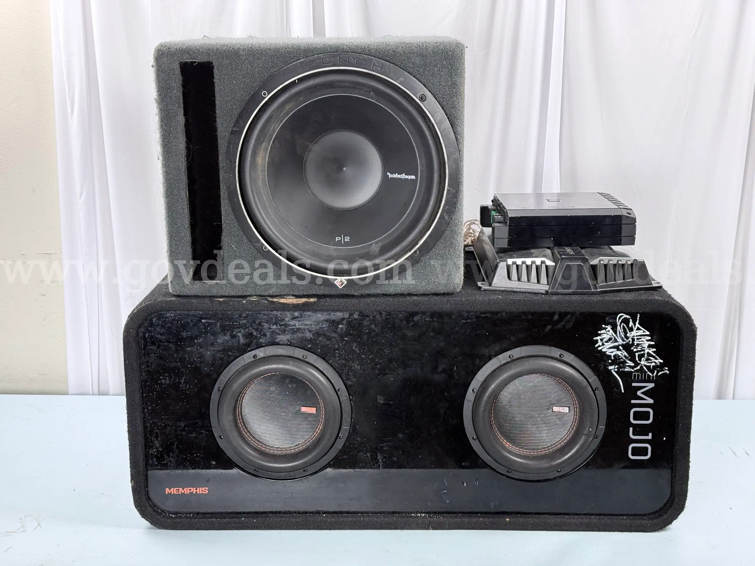 Lot of Car Audio Subwoofers and Amplifiers Including Memphis Audio RockFord Fosgate Xplod and Alpine