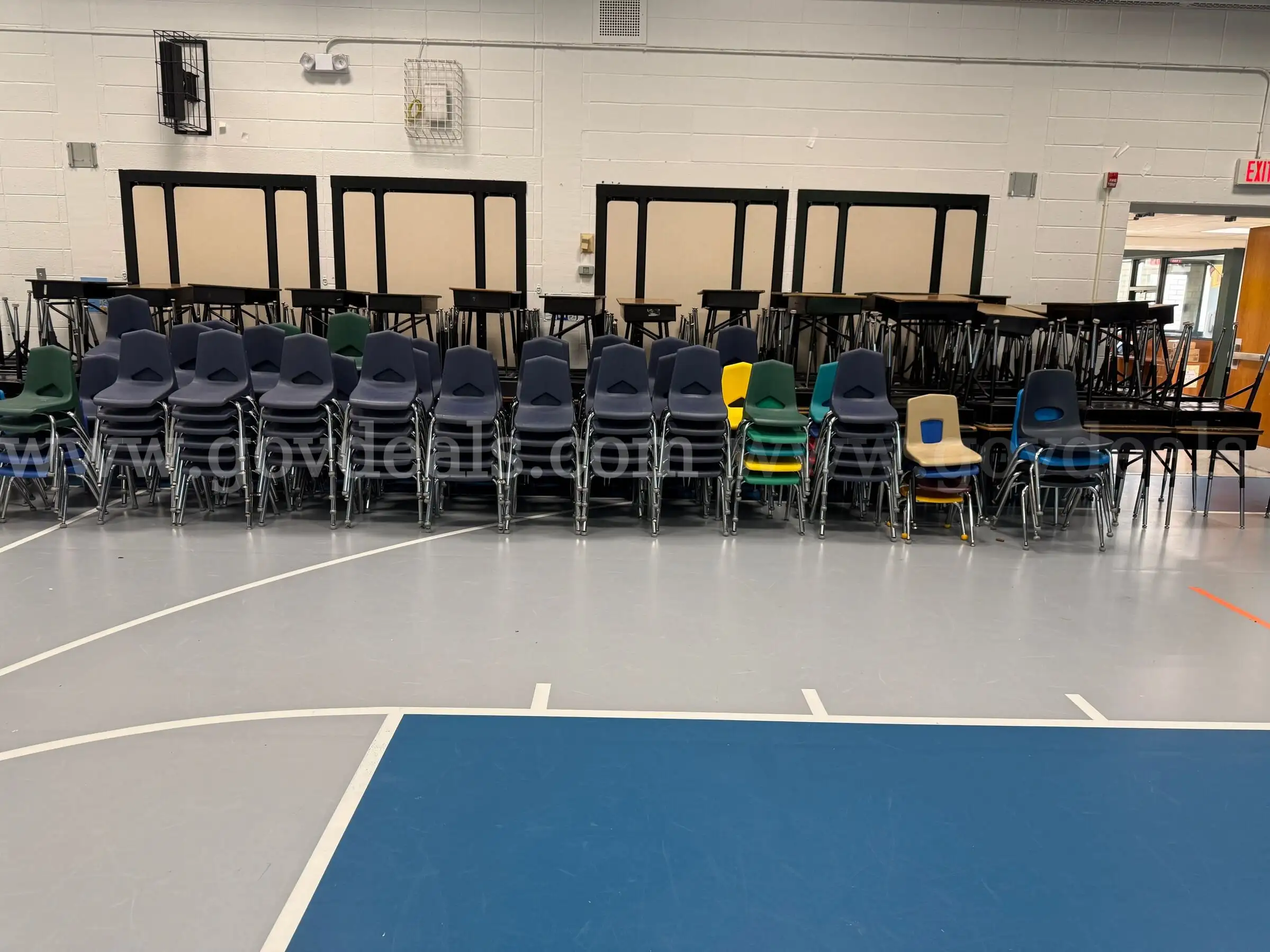 Adjustable desks for a First grade classroom as well as chairs varying colors (not adjustable)