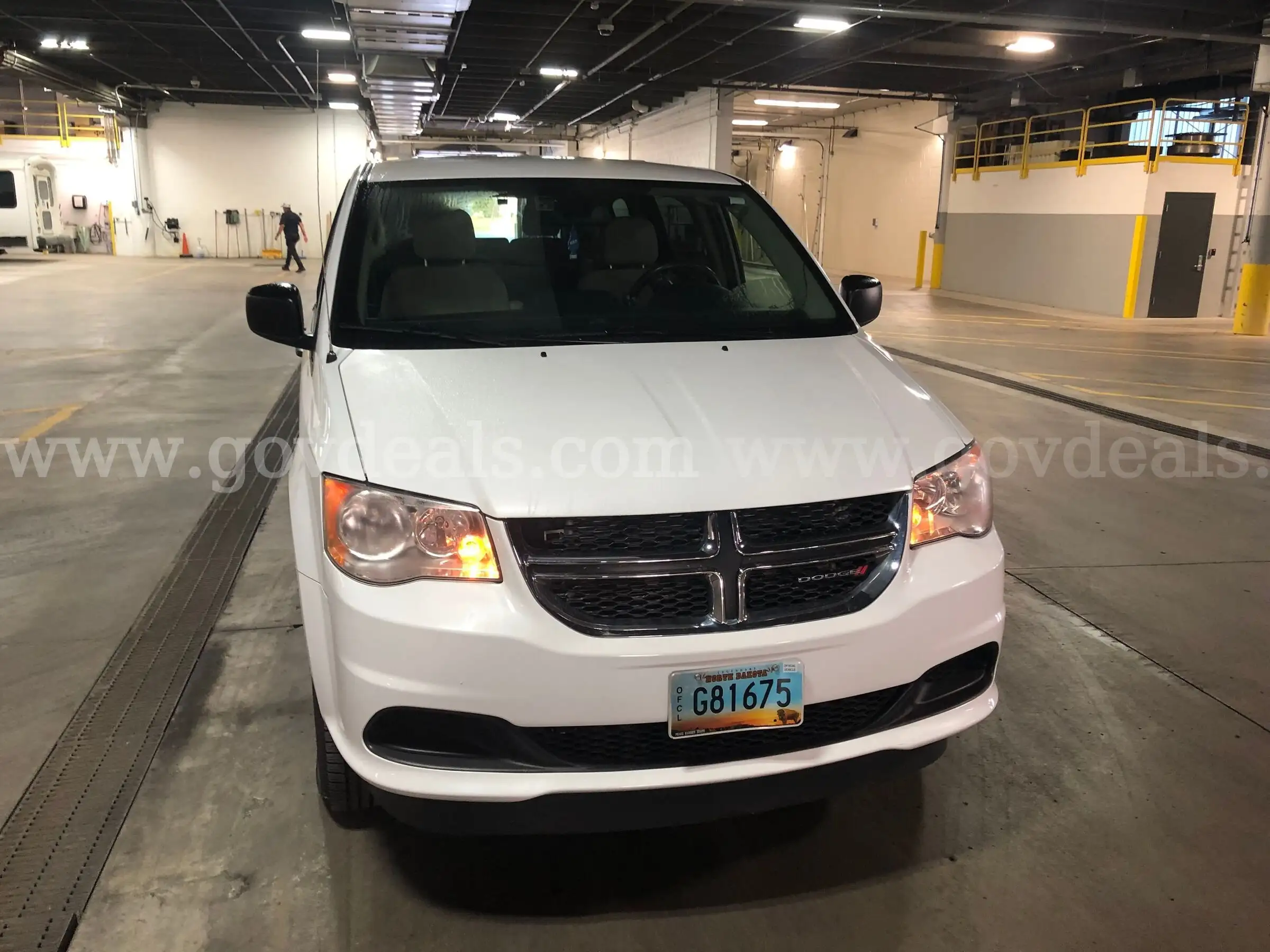 2019 White Dodge Caravan(Entervan) Wheelchair accessible with a manual pull out ramp. In Good condit