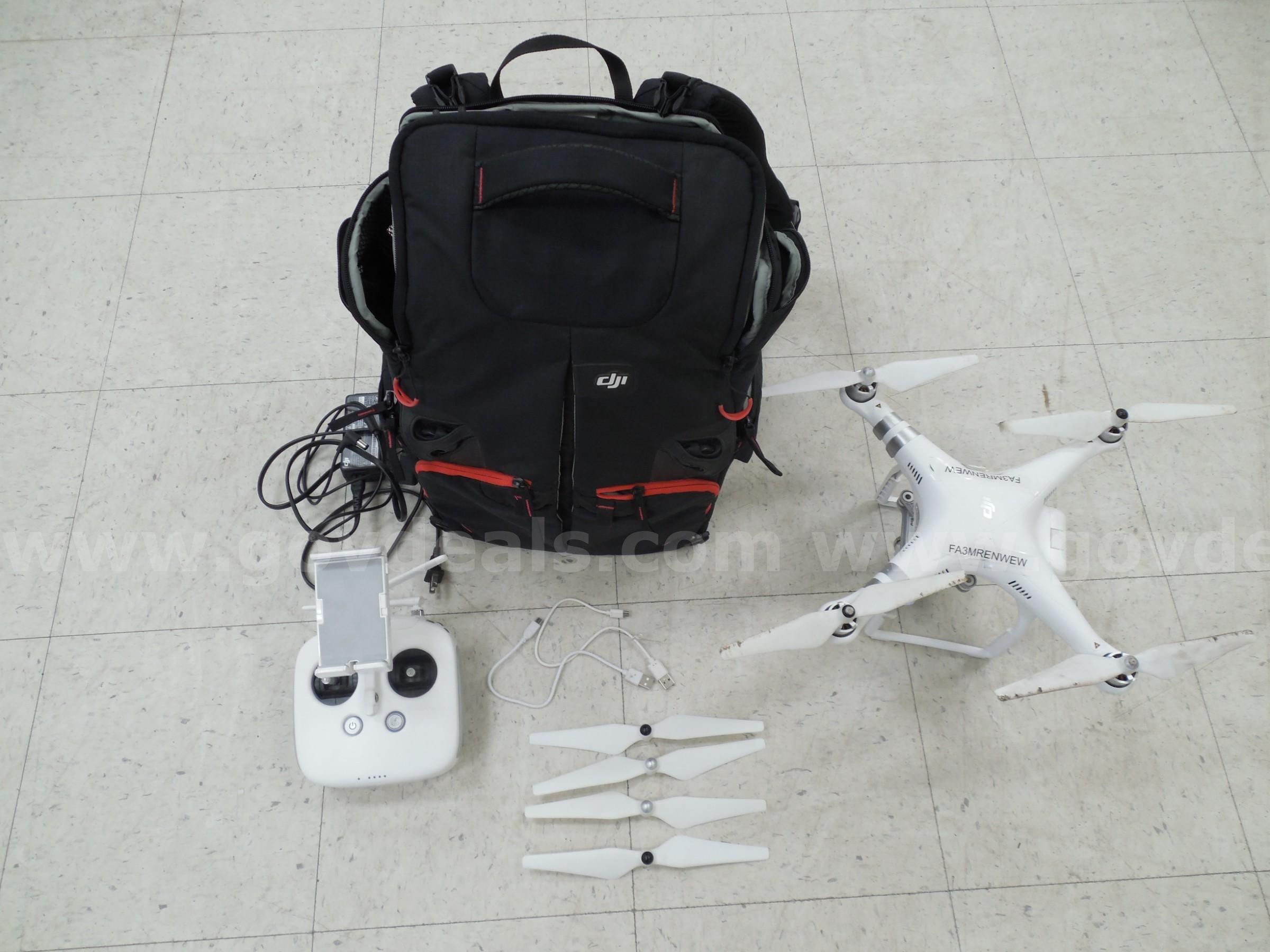 DJI drone with accessories and backpack